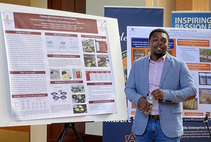 Johnathan Mitchell, Tuskegee University graduate student, presents research poster