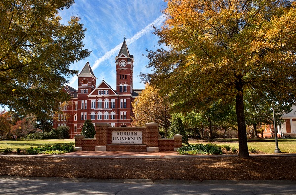 Samford Hall front lawn with autumn foliage