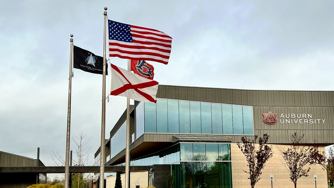 flags fly at the Auburn University Research & Innovation Campus in Huntsville, Alabama