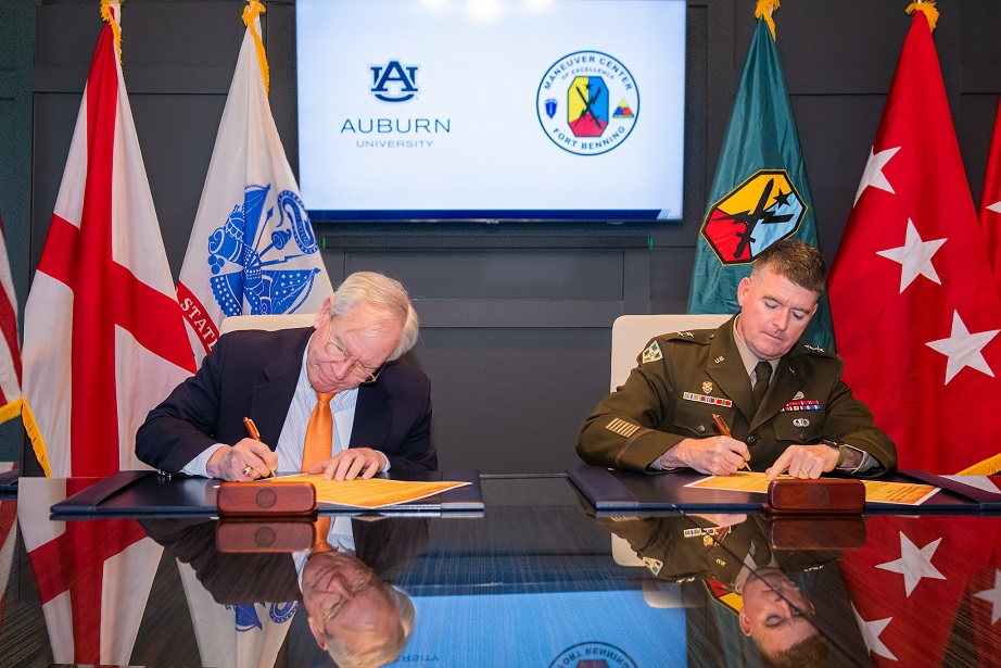 Auburn Executive Vice President Lt. Gen. (ret.) Ron Burgess, left, and Fort Benning by Maj. Gen. Patrick J. Donahoe, commanding general, Fort Benning and the Maneuver Center of Excellence, signing environmental services agreement