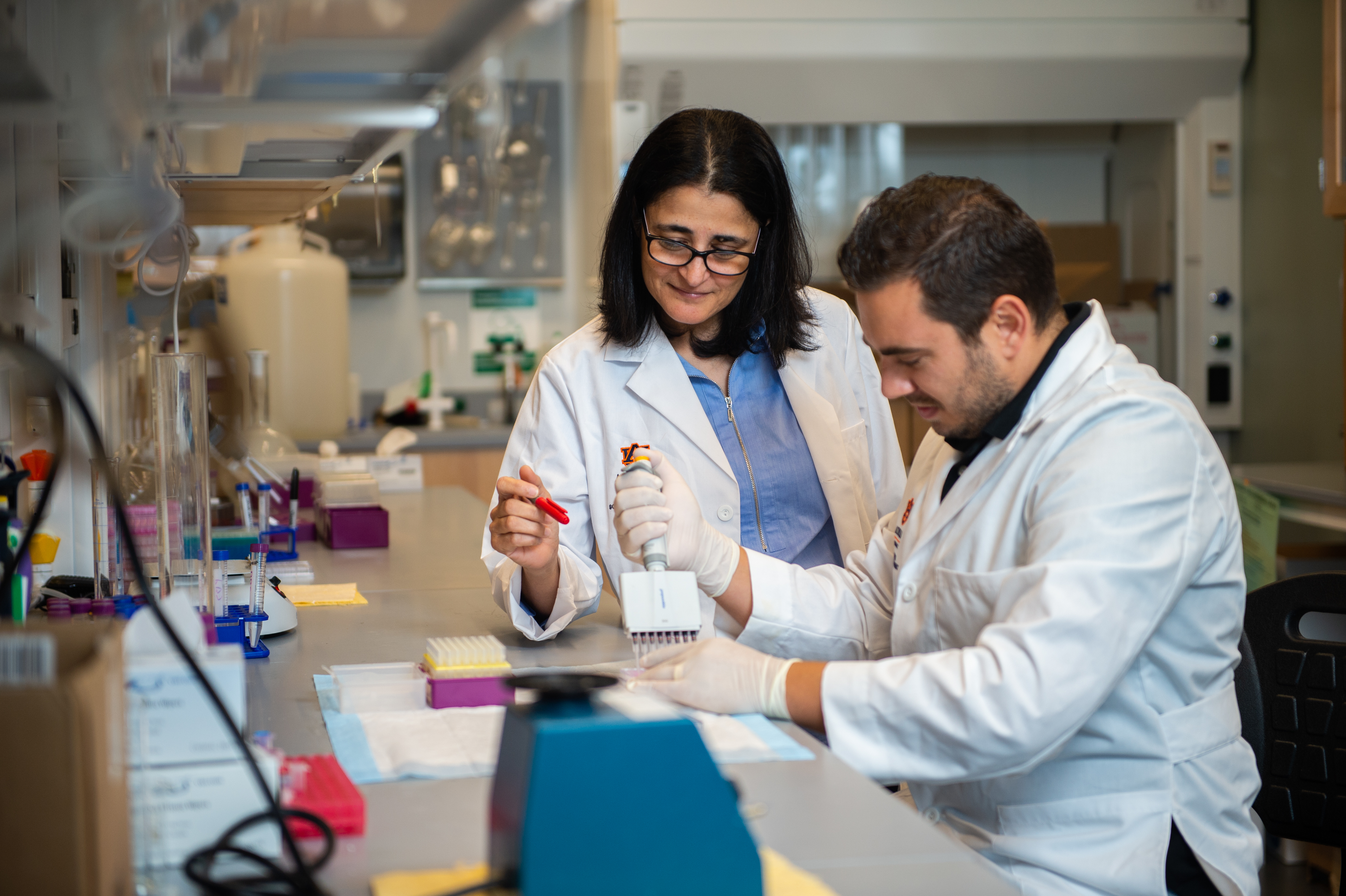 Dr. Amal Kaddoumi and graduate research assistant Sweilem Al Rihani in laboratory