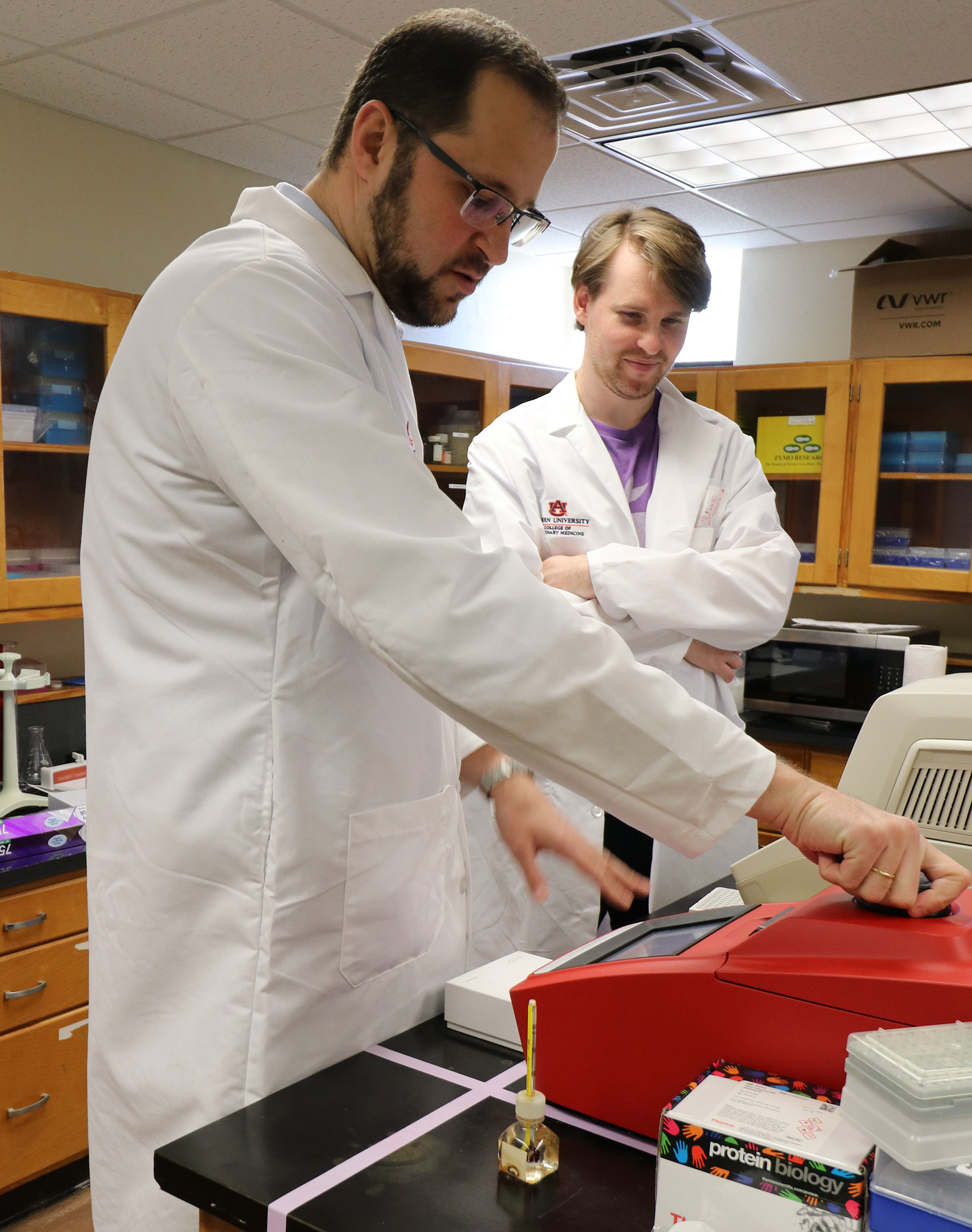 Dr. Constantinos Kyriakis and graduate researcher Fletcher North in laboratory