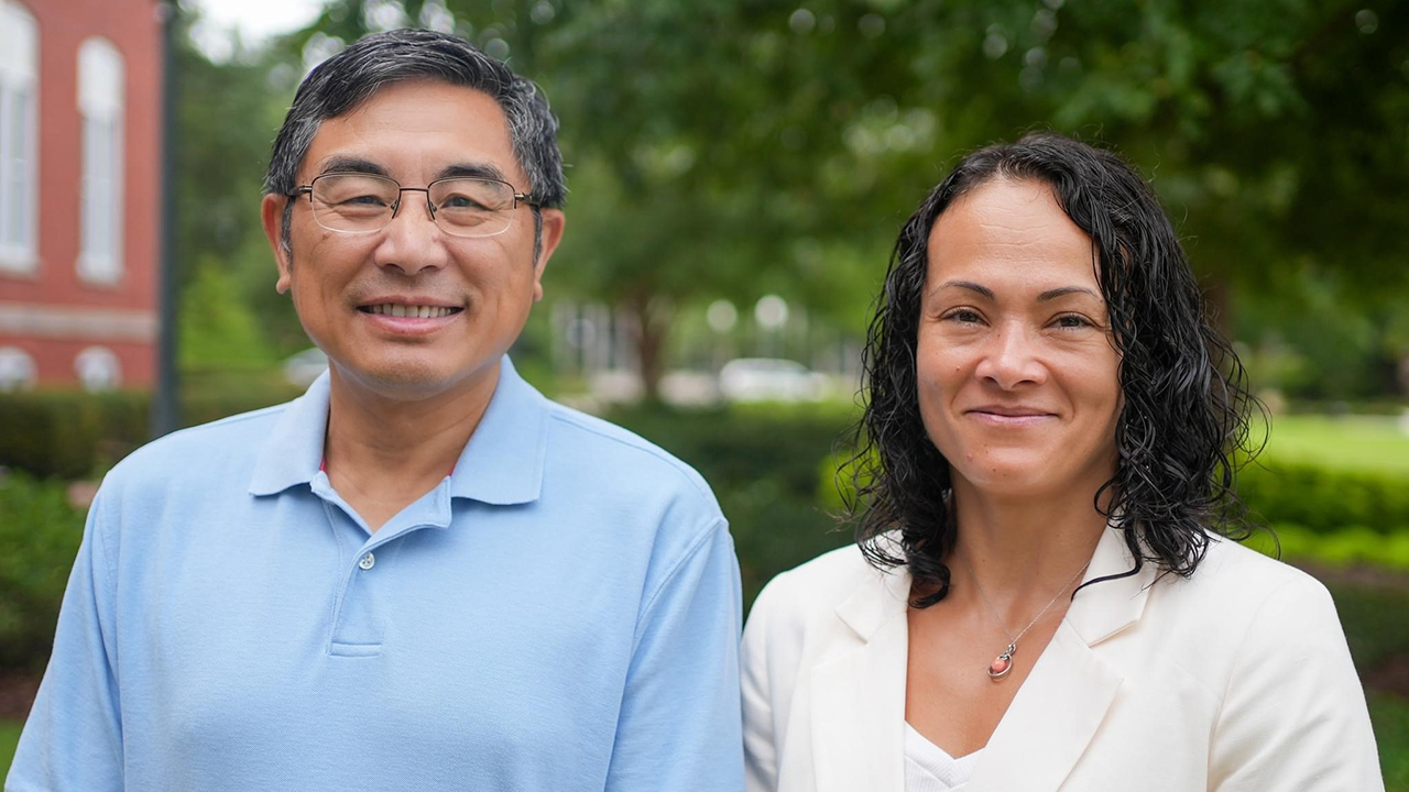 From left, Zhihua Jiang, the Auburn Pulp and Paper Associate Professor in chemical engineering, and Selen Cremaschi, the B. Redd & Susan W. Redd Professor and chemical engineering chair, outdoors