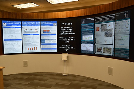 posters on display on digital wall at Ralph Brown Draughon Library at Auburn University