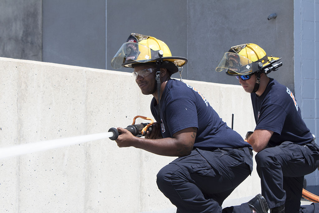 Auburn Firefighters take aim during safety training at Jordan-Hare