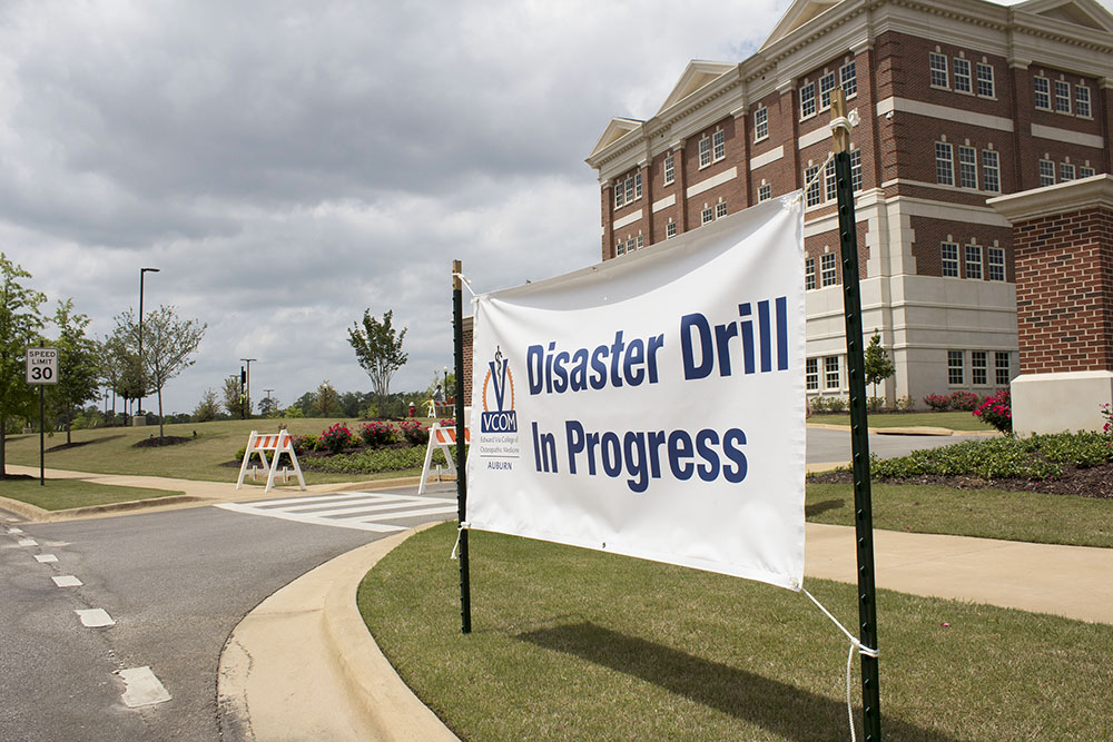 Disaster Drill Day banner and VCOM building